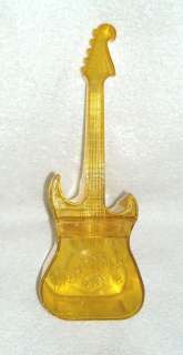 HARD ROCK CAFE PLASTIC YELLOW GUITAR CONTAINER  