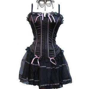  corset dress in a black with pink dotted strips and ribbons top with