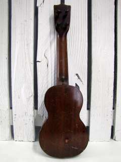   including a Kala padded gig bag and two sets of Aquila Nylgut strings