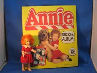 Columbia pictures Annie 6 doll and Topps Sticker Album  