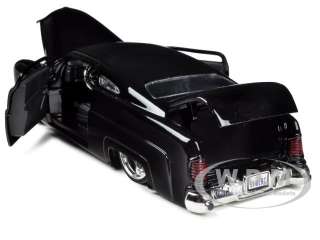   24 scale diecast model car of 1951 mercury black with kmc wheels die