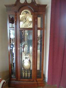   Grandfather clock w/side cabinets & awesome beveled glass great cond