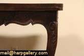An authentic Country French dining table was hand carved about 1920 of 