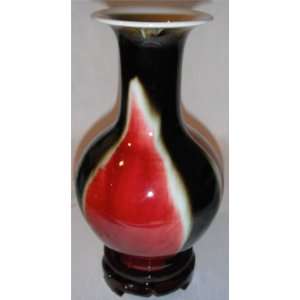   Burgundy Black 7x14 Ceramic Vase with Wooden Stand.