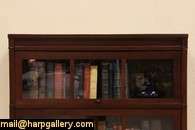 an authentic 3 stack arts and crafts period lawyer bookcase dates from 