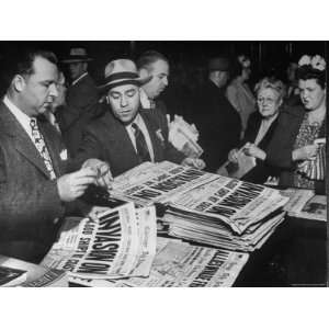 People Buying Newspapers Headlining the June 6, 1944 D Day Invasion of 