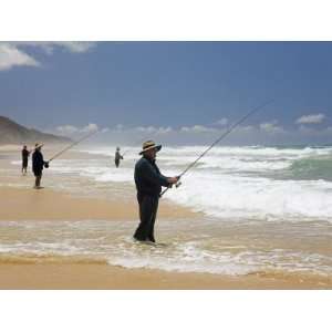  Queensland, Fraser Island, Fishermen Wade into the Surf on 