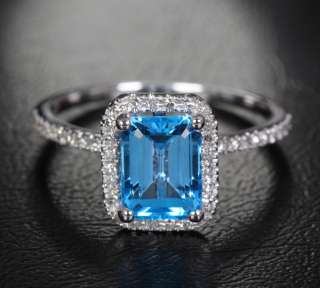 21ct Emerald Cut Blue Topaz .21ct Diamond 14K White Gold Halo 