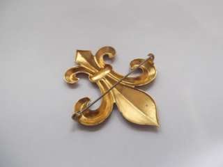 This is a huge goldtone Fleur de lis Pin or brooch. It is goldtone 